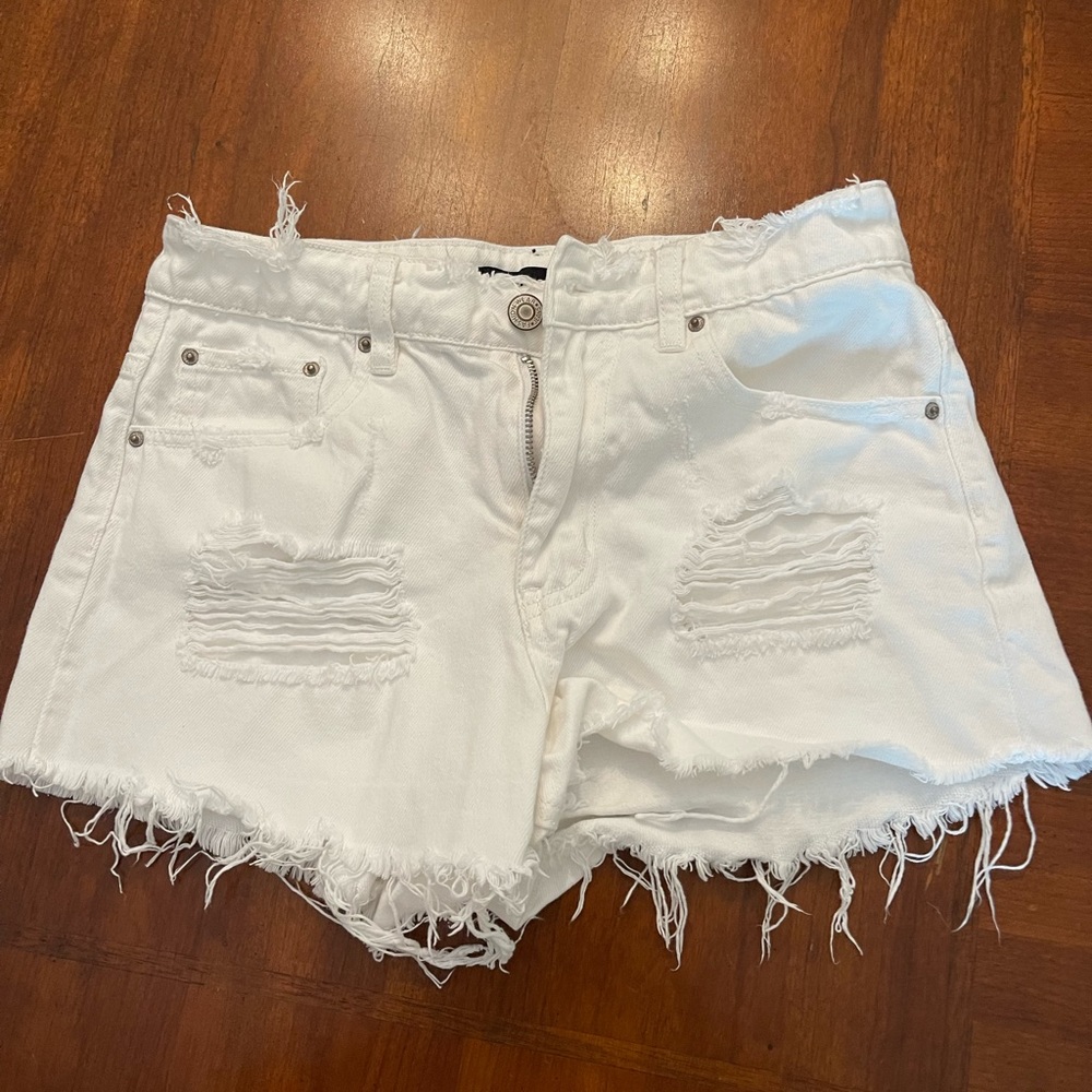 white jean shorts with rips!! size small